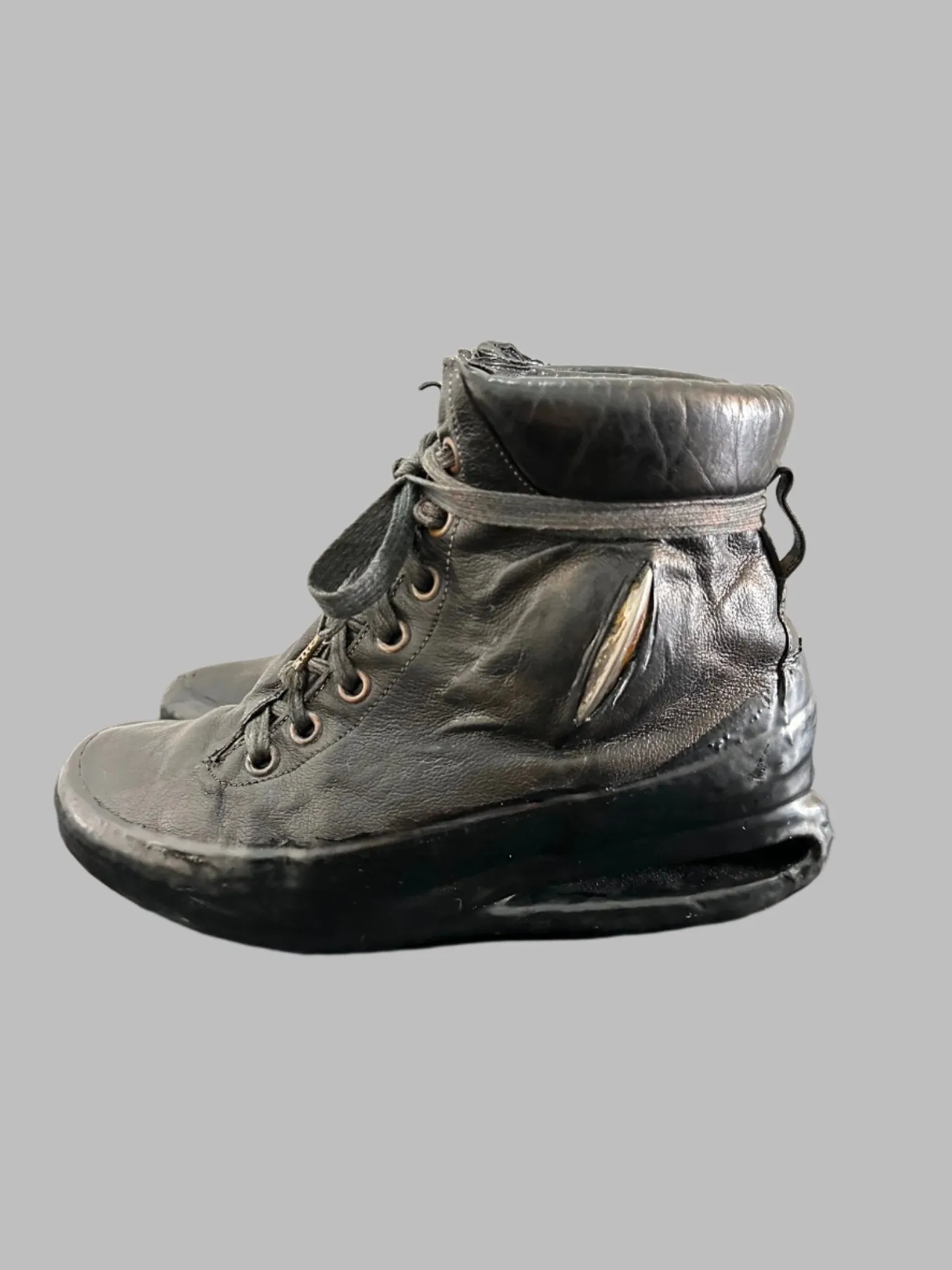 Black One Piece U-Sole Prosthetic Drip Sneakers by Carol Christian Poell