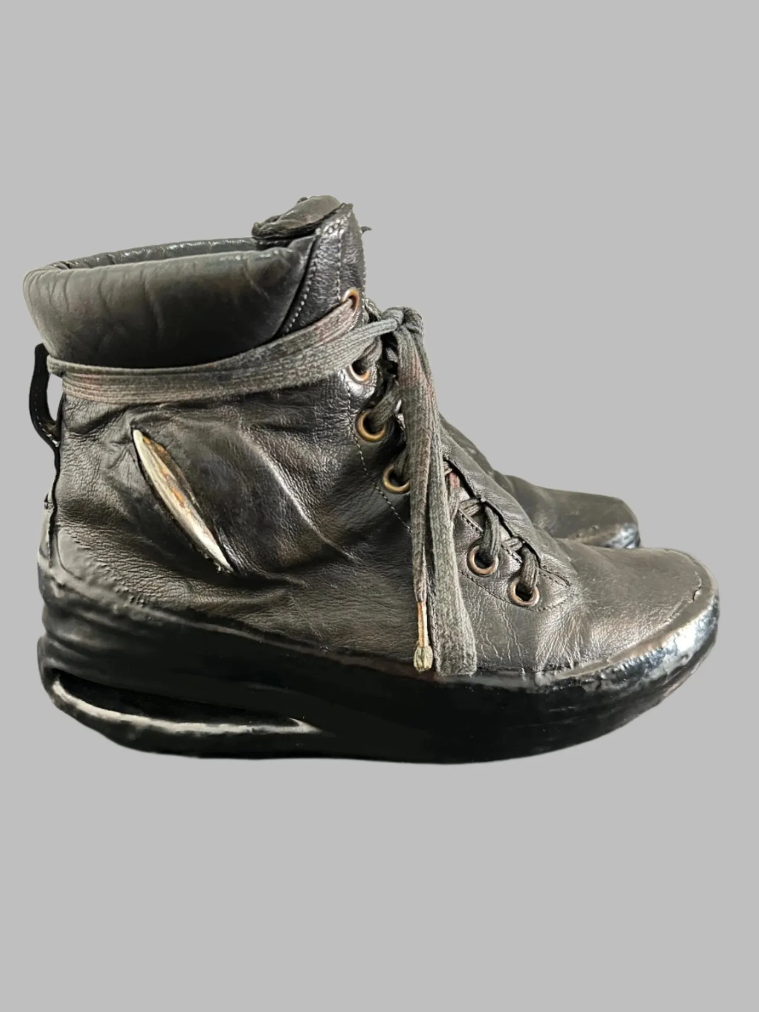 Black One Piece U-Sole Prosthetic Drip Sneakers by Carol Christian Poell