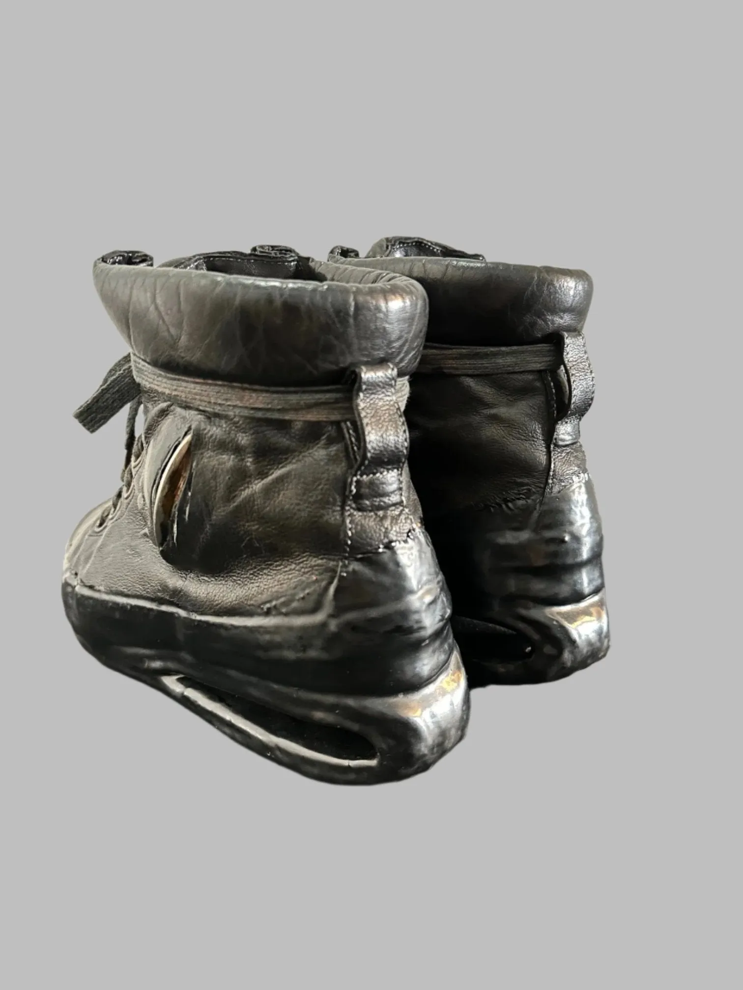 Black One Piece U-Sole Prosthetic Drip Sneakers by Carol Christian Poell