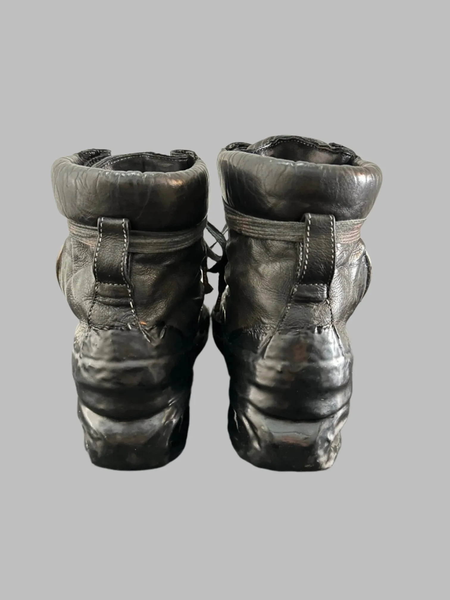 Black One Piece U-Sole Prosthetic Drip Sneakers by Carol Christian Poell