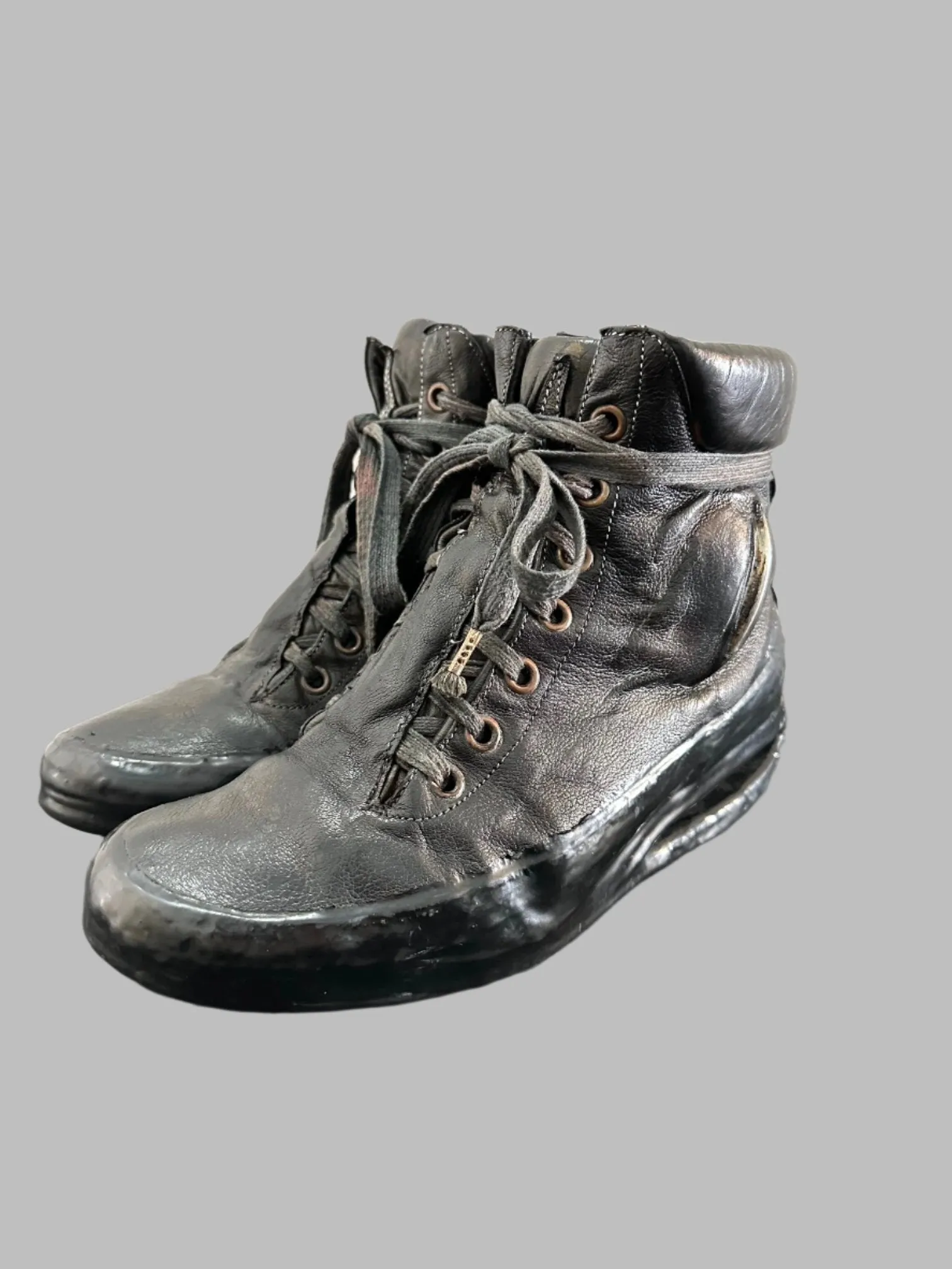 Black One Piece U-Sole Prosthetic Drip Sneakers by Carol Christian Poell