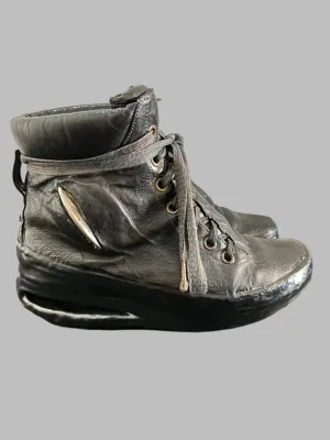 Black One Piece U-Sole Prosthetic Drip Sneakers by Carol Christian Poell